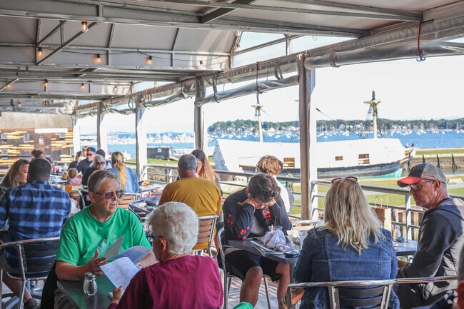 Visitors enjoy breathtaking views at the Oyster Fest on Derby Street.