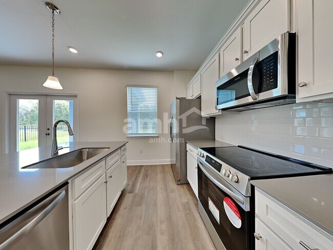 27121 St Andrews Ave, Wesley Chapel, FL 33544 - photo 5