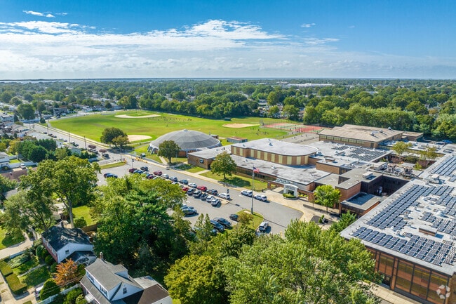 Lindenhurst High School has 1,845 students in grades 9-12 .