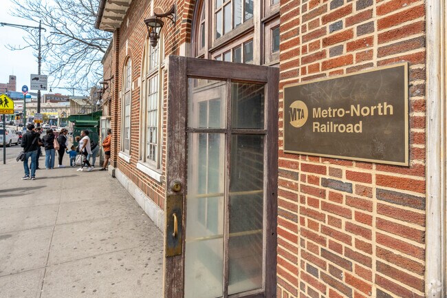 The Metro North station can offer shade and rest while you wait for your train in Fordham Manor.