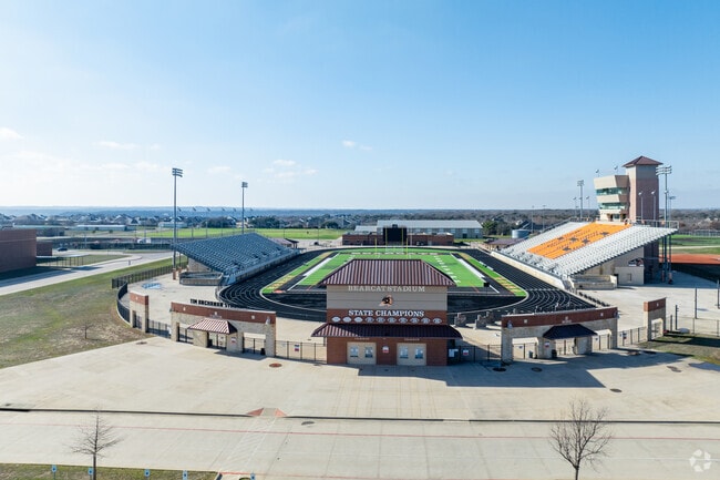 Championship dreams take flight in Aledo High School's Bearcat Stadium.