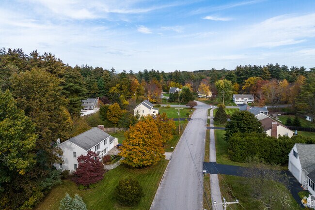 West Hollis homes are spread out along suburban residential roads.