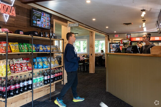 Riverside Pizza in Contoocook is right in the middle of town and offers dine in options.