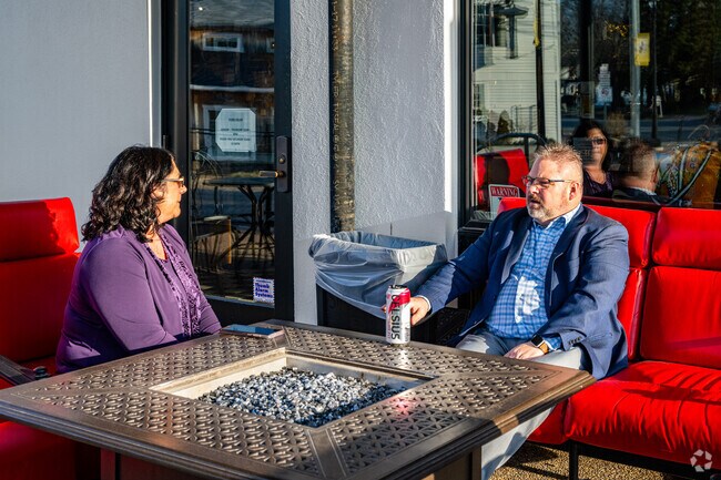 Metamora locals can relax with a cold drink outside the Metamora General Store and discuss political issues.