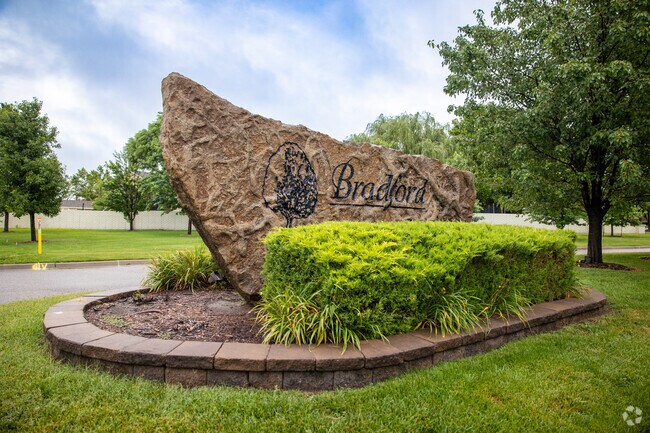 You will find a large stone with the name for Bradford-Sterling Farms engraved onto it.