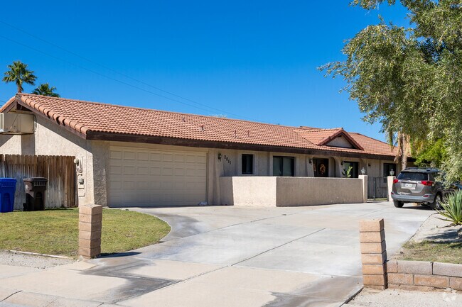 Nestled among pristine landscapes, homes in Racquet Club South are a testament to fine living.