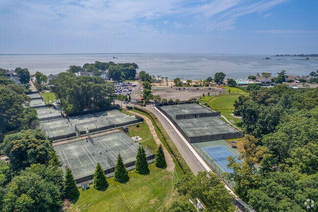 Families enjoy spending time at the beach at Bayley Beach in Rowayton.