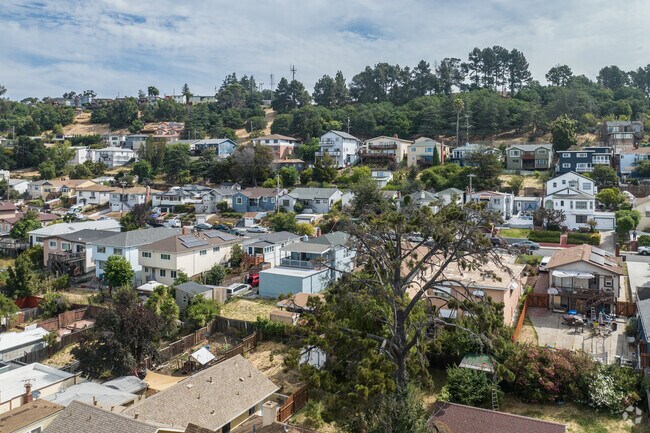 The Toler Heights neighborhood is in the lower Oakland hills and homes are built into the hills.