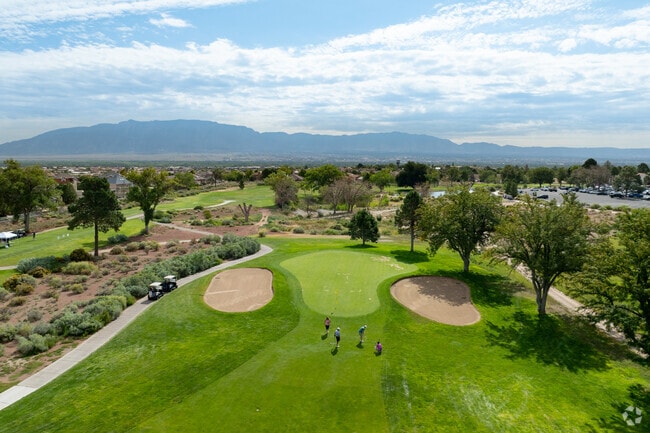 Golfers play the public 18-hole Paradise Hills Golf Course.