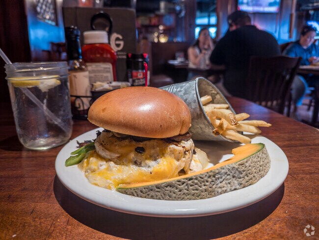 McGlynn's Pub, by Kent Acres, has a delicious crab-topped burger on the menu.