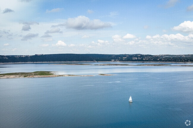 Sail boats enjoying a day on the Colorado River of Lake Travis.