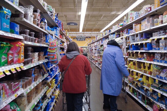 Shoppers take care of their grocery needs at the local Kroger near Lake Forest