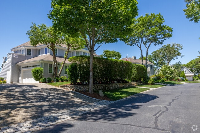 Dense bushes offer privacy to these homes of New Seabury-Popponesset Island.