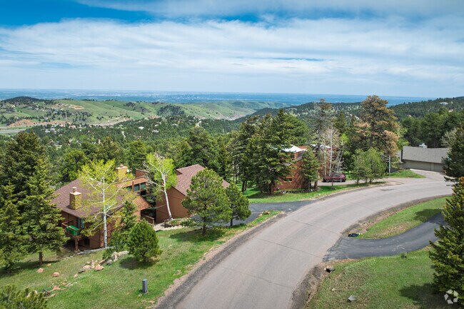 Modern cabin-style homes with stunning views line the Genesee Central neighborhood.