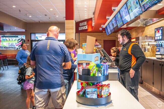 Nava Ade locals buy snacks before can catching a movie at the Regal Cinema.