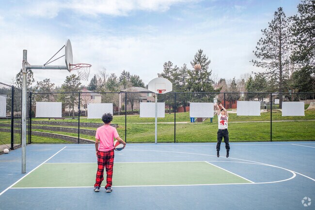 Work on your free throws with friends on the Happy Valley Park basketball courts.