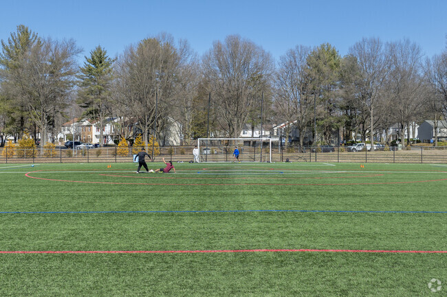 The soccer field at Allen Pond Park is newly surfaced with astro turf and is a popular place for locals to play.