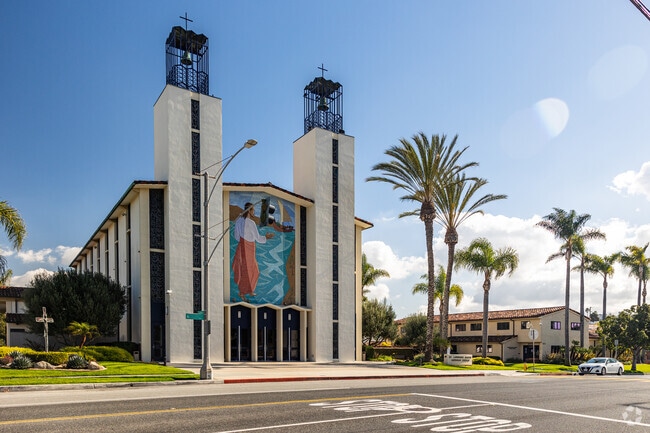 A large church with two towers and mural distinguish St Lawrence Martyr School in Redondo Beach.
