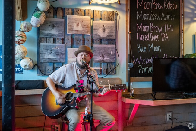 Lewisville residents can enjoy live music and tasty food and drinks at the Full Moon Oyster Bar nearby.