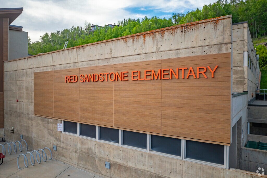 Red Sandstone Elementary in Vail, Colorado is a nurturing learning environment framed by mountain views—where kindergartners to fifth-graders flourish through creative lessons, joyful playgrounds, and a strong sense of community and belonging.