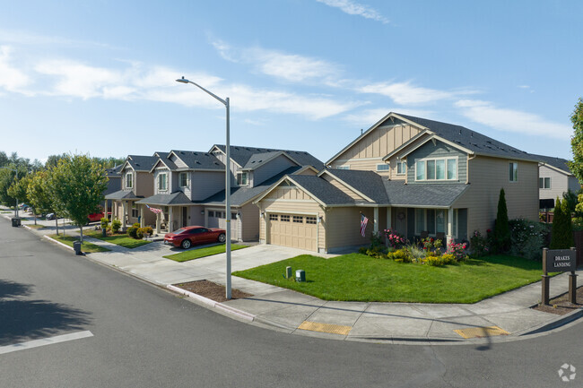 Subdivisions like Drakes Landing have large contemporary homes along NE 53rd St in North Image.