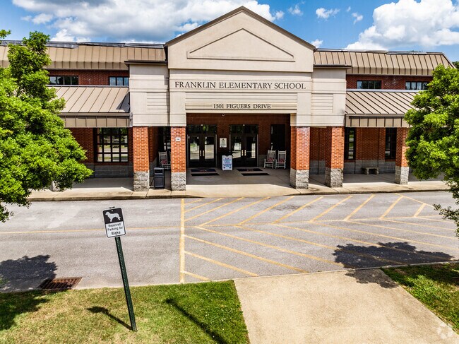 Children catch the bus to Franklin Elementary in Downtown Franklin.