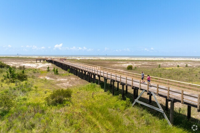 The boardwalk to Dauphin Beach takes you over the dunes to the sand of the beach.
