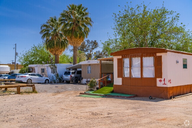 Rows of manufactured homes in Aguila offer residents affordable living with scenic desert surroundings.