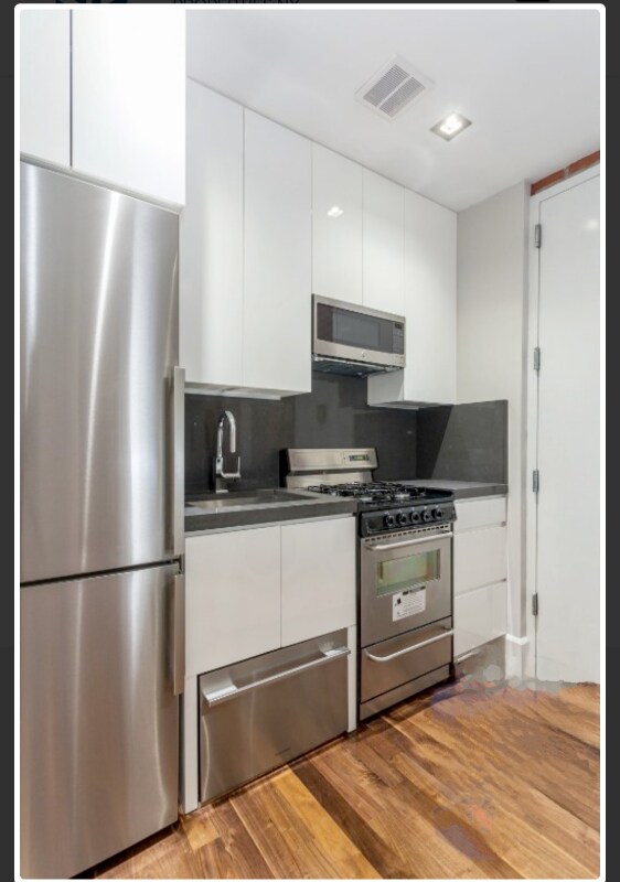 E 108th St 2nd Ave unit 8, New York, NY 10029 - photo 1