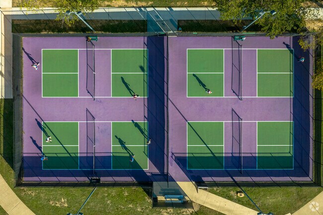 Newly paved pickle ball courts in Bear Creek Park is a popular place for North Keller residents.