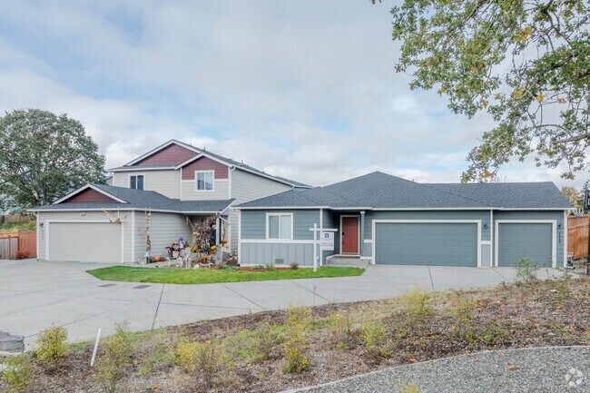 A row of traditional style homes sit in a cul-de-sac just outside Nisqually Indian Community.