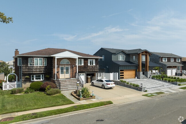 Rows of colonial style homes are seen throughout Lido Beach, NY.