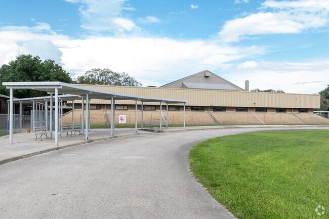 The pick up line at Sebring Middle School helps to organize the transition of students.