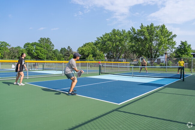 Norwood Park includes open fields, a playground, and pickleball courts in a quiet setting.