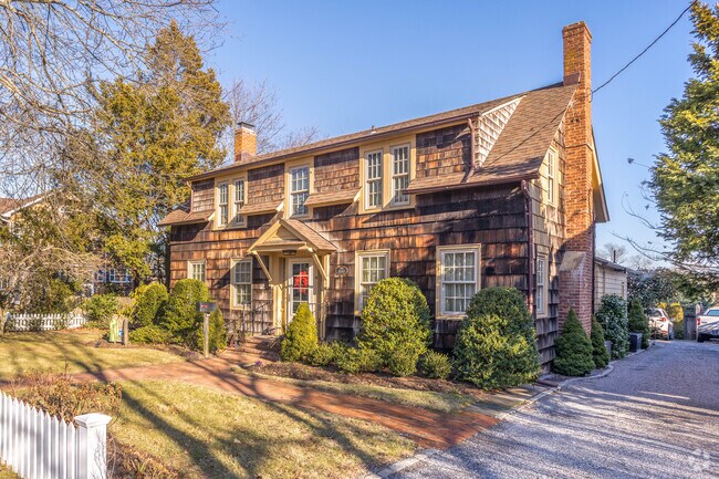 Wood shingled exteriors blend well with northeast color schemes in Amityville.