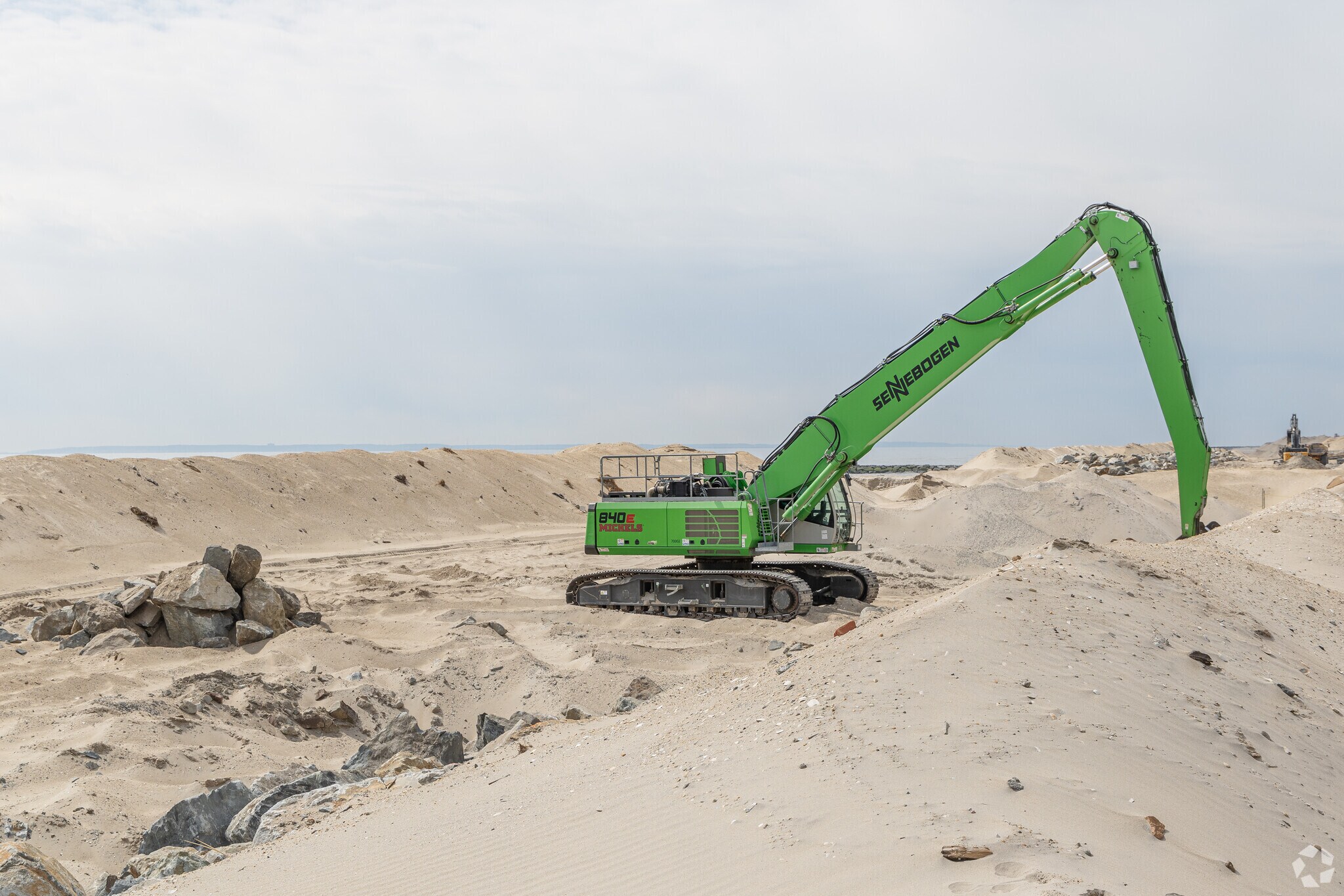 Protection against floods with dunes and rocks during the winter in Edgemere.