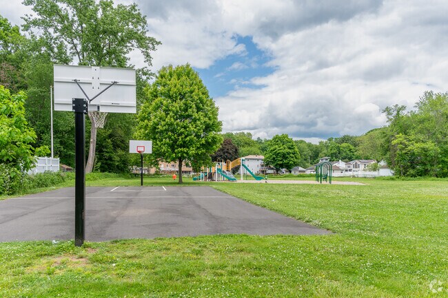Locals have access to a basketball court & playground at Michael St Park in Quinnipiac Meadows.