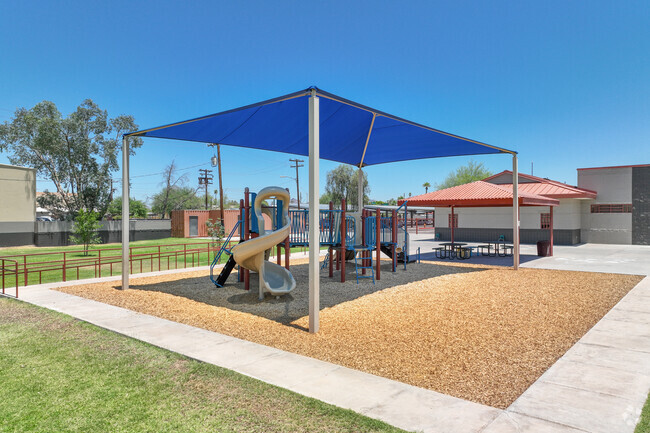 Shaded playgrounds for all students are offered at Excelencia School in central Phoenix.