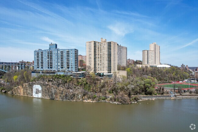 Spuyten Duyvil has multiple high rise co-ops with views.