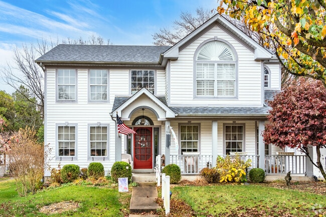 Many homes in Spanish Lake neighborhood have landscaped yards.