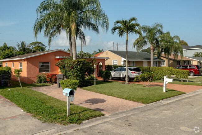 Multiple home types line this street in the Pine Air neighborhood of Palm Springs, FL.
