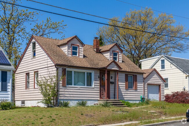 Many homes in Bellmawr have small yards, like this Cape Cod.