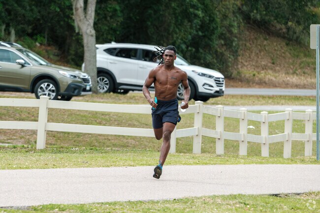 A Clermont resident goes for a run along the 13-mile South Lake Trail.