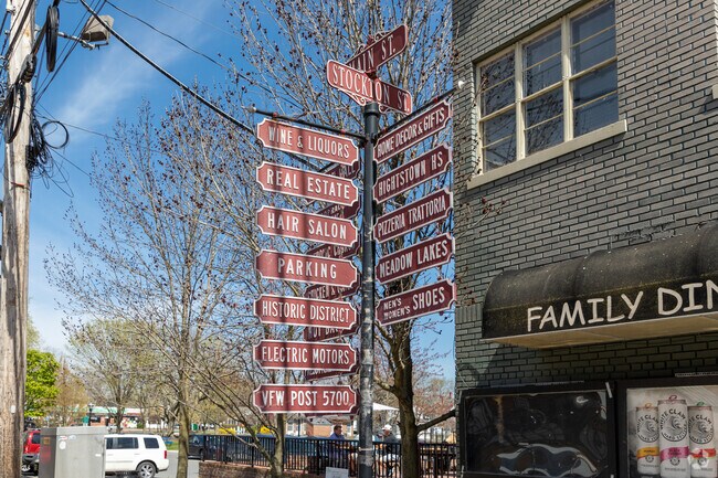 Tree pole signs help guide visitors through downtown Hightstown.