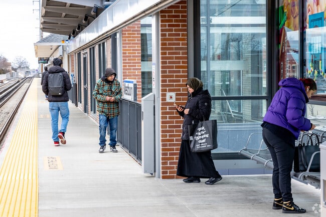 New Cassel residents catch the train at the Westbury train station.