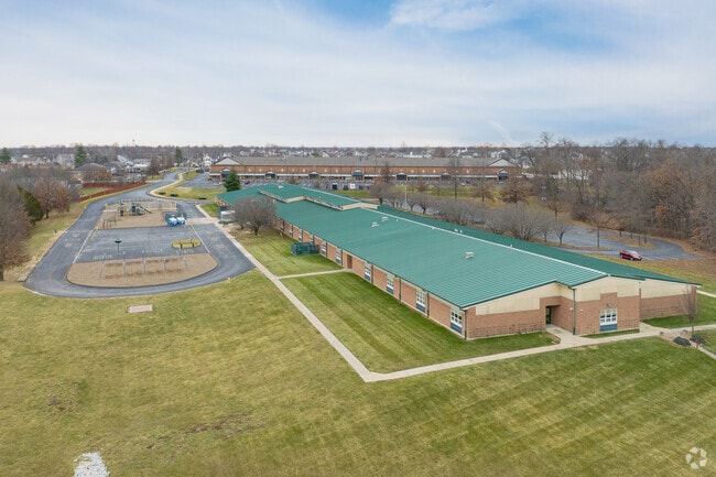 Rock Creek Elementary School is located off of the main road surrounded by subdivisions.