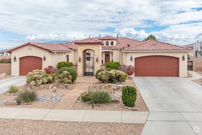 Volcano Cliffs features elegant Spanish-style homes with classic stucco exteriors.