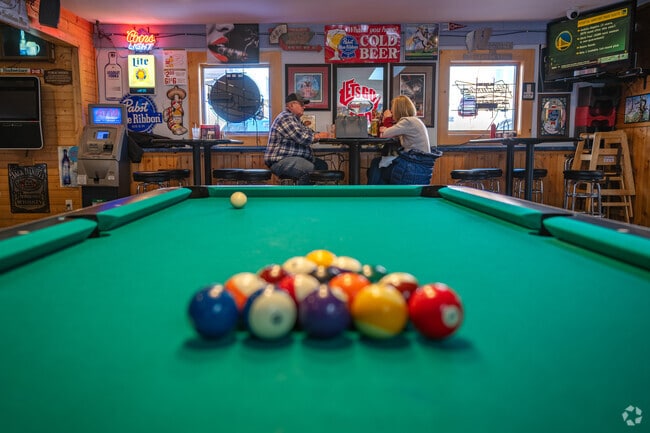 Play some pool or catch up with friends at Pauls Neighborhood Bar in Sak's Woods.