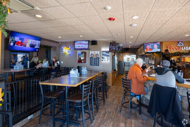 Locals enjoy dining and watching sports at Charlie’s in Becker.
