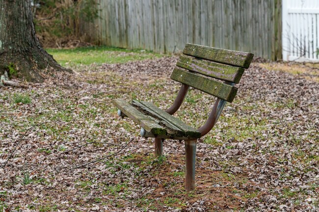A bench welcomes Arden parents watching their kids play at Northcrest Park.
